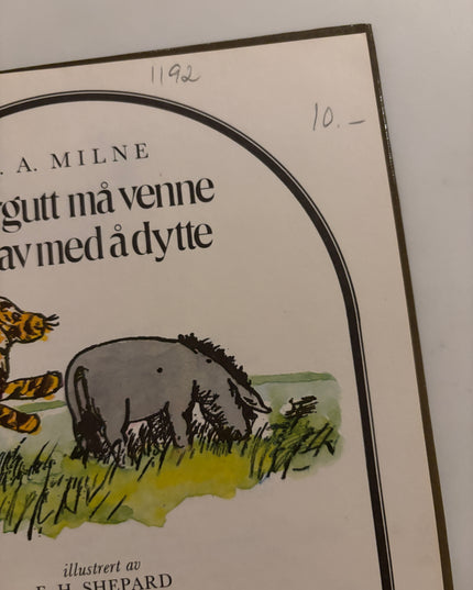 Milne, A. A: Tigergutt må venne seg av med å dytte