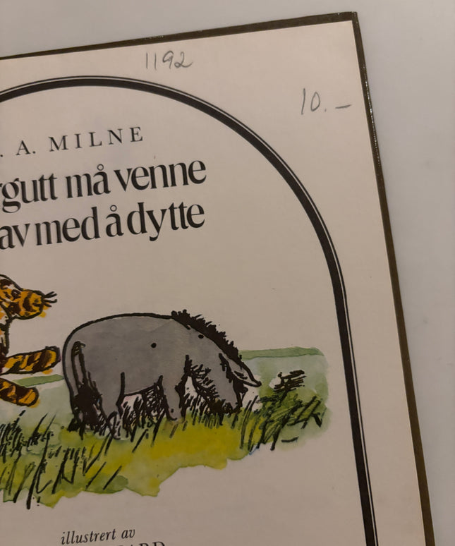 Milne, A. A: Tigergutt må venne seg av med å dytte