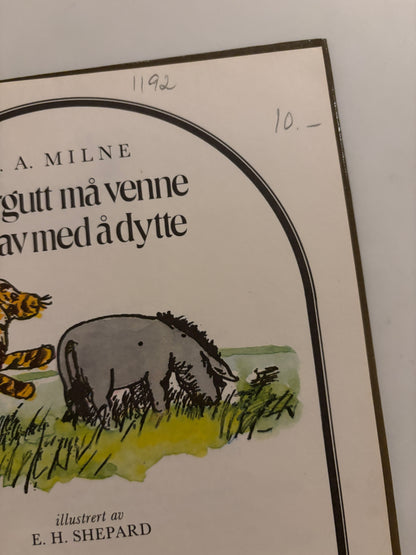 Milne, A. A: Tigergutt må venne seg av med å dytte
