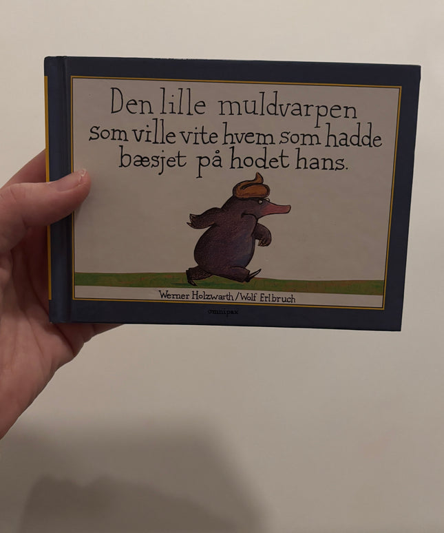 Holzwarth, Werner: Den lille muldvarpen som ville vite hvem som hadde bæsjet på hodet hans