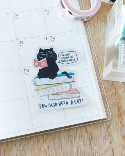 Klistremerke Vinyl | You can't survive on books alone | Katteklistremerke